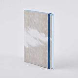 Nuuna - Cuaderno Inspiration Book M | Sky blue pages with white clouds