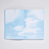 Nuuna - Cuaderno Inspiration Book M | Sky blue pages with white clouds
