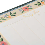 Detalle del borde floral del planificador Aster