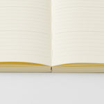 MD Product - Agenda mensual MD Notebook Diary 2027 | A6 · detalle de papel y encuadernación